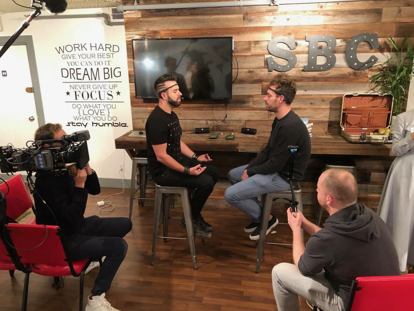 Two competitors meditating face-to-face in the Meditation Battle League